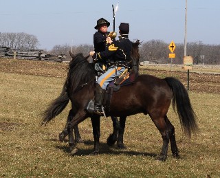 Colonel and 1st Sgt demonstrate saber fighting skills